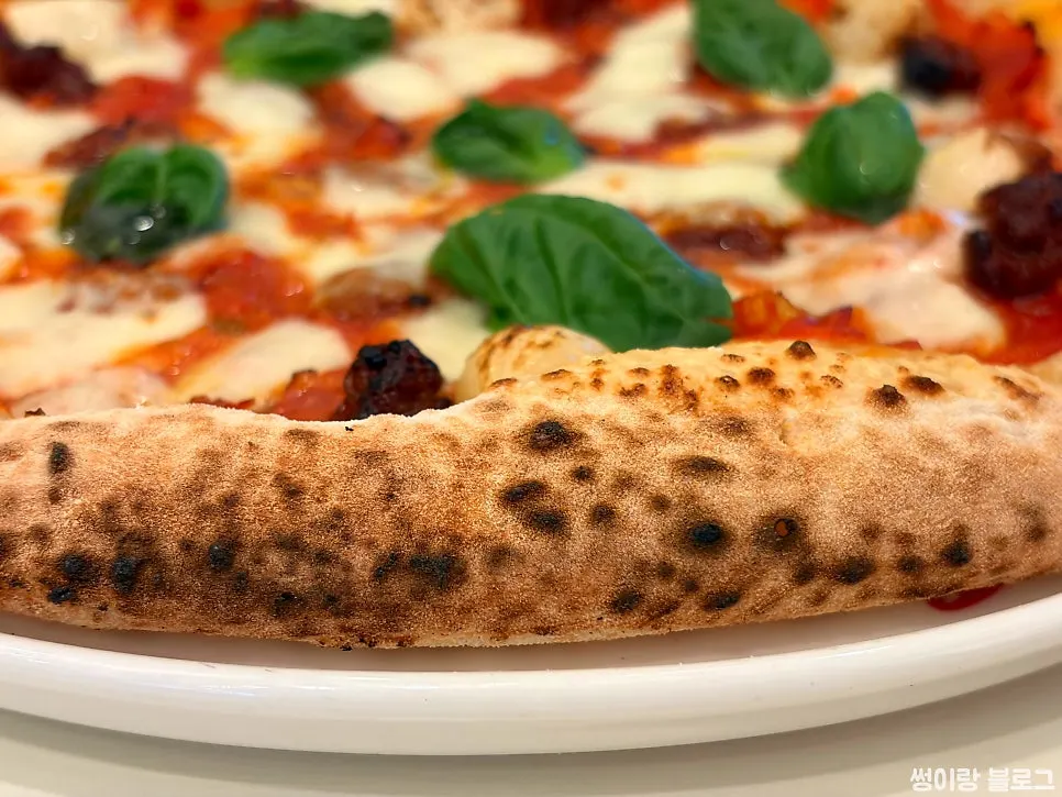 'Nduja pizza topped with chorizo and buffalo mozzarella