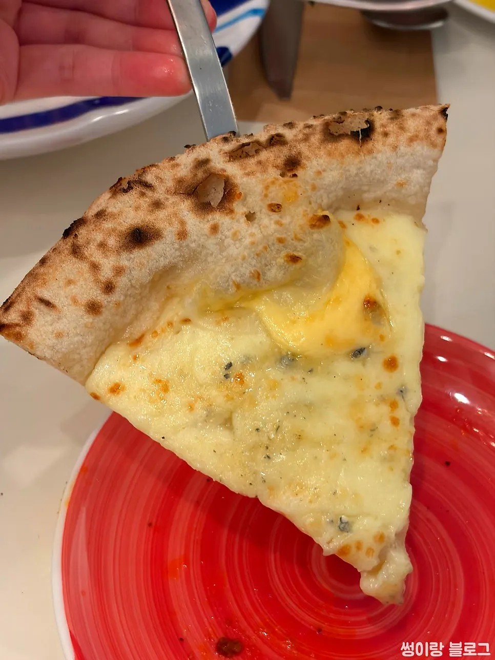 Quattro Formaggi pizza with melted cheese