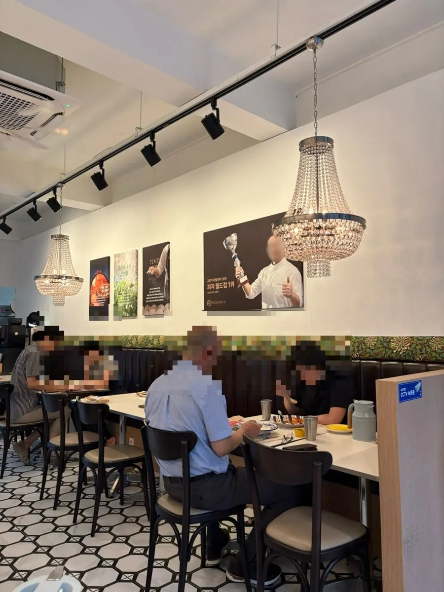 Interior seating at Pizzeria O Hapjeong Station