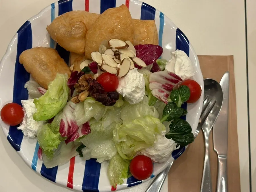 Close-up of ricotta cheese and lettuce