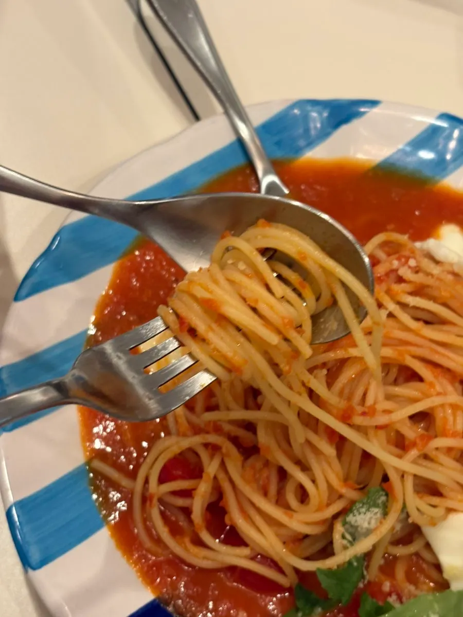 A slice of Pomodoro con Bufala pizza