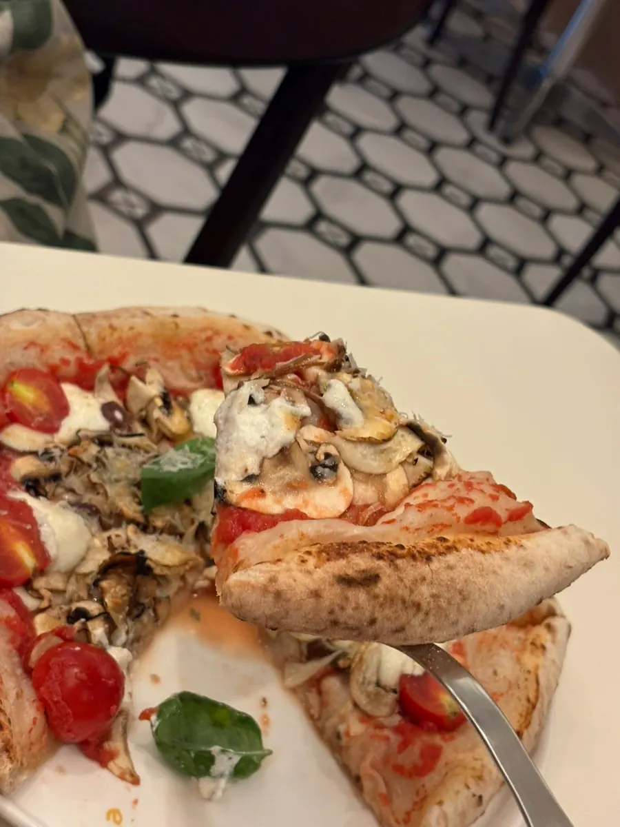 Paccia topped with mushrooms and cheese