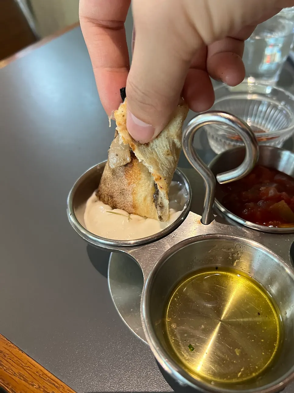 Pizza dough dipped in ranch and salsa sauce