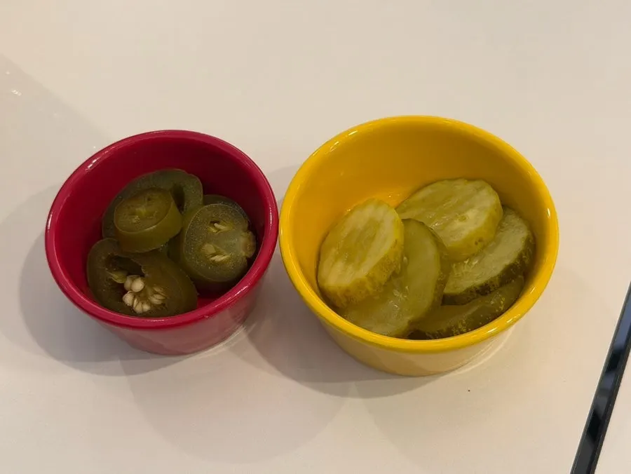Complimentary jalapeños and pickles