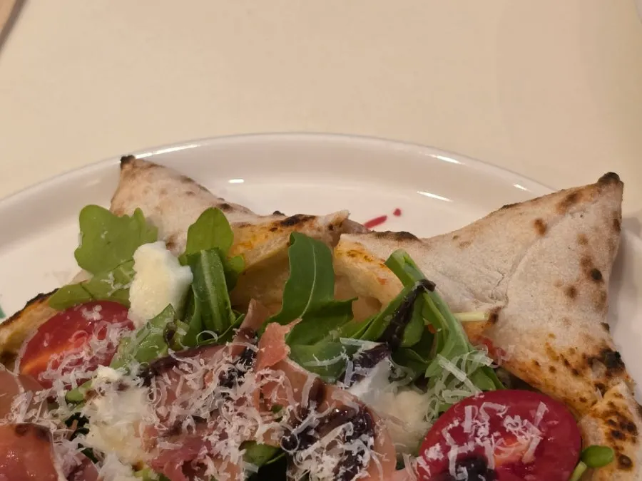 Wood-fired Stella pizza loaded with toppings