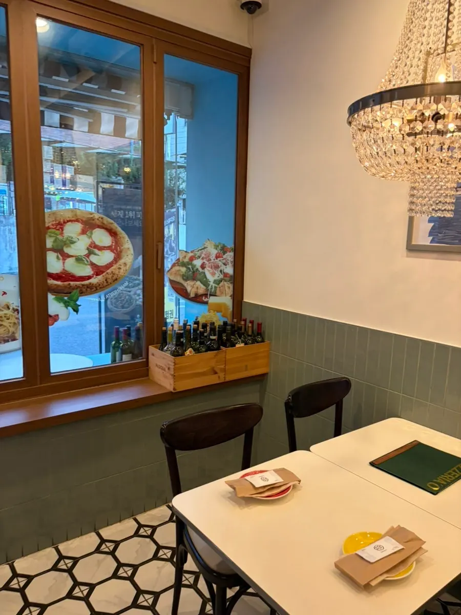 View of the restaurant with generous table spacing