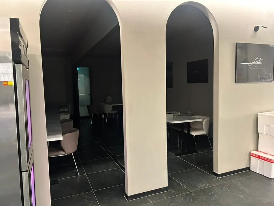 Back seating area at Plate Dunsan Branch with lights off on a weekday afternoon