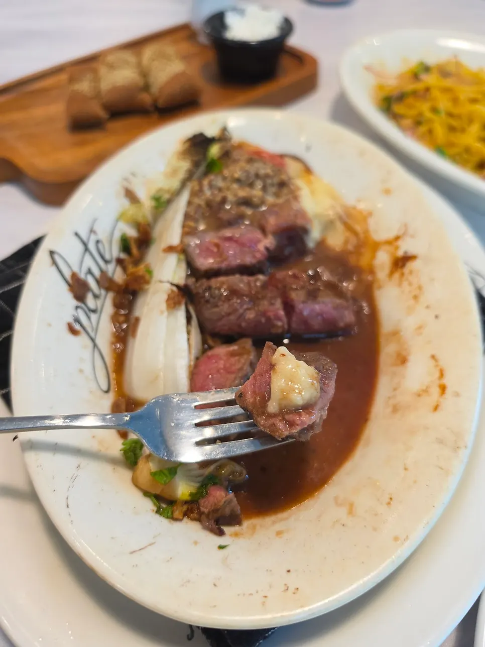 Steak with its accompanying sauce