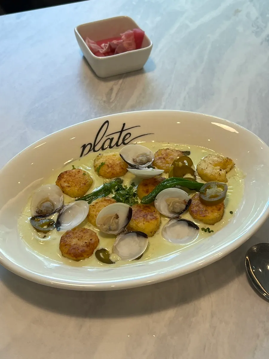 A plate of cheongyang vongole cream gnocchi