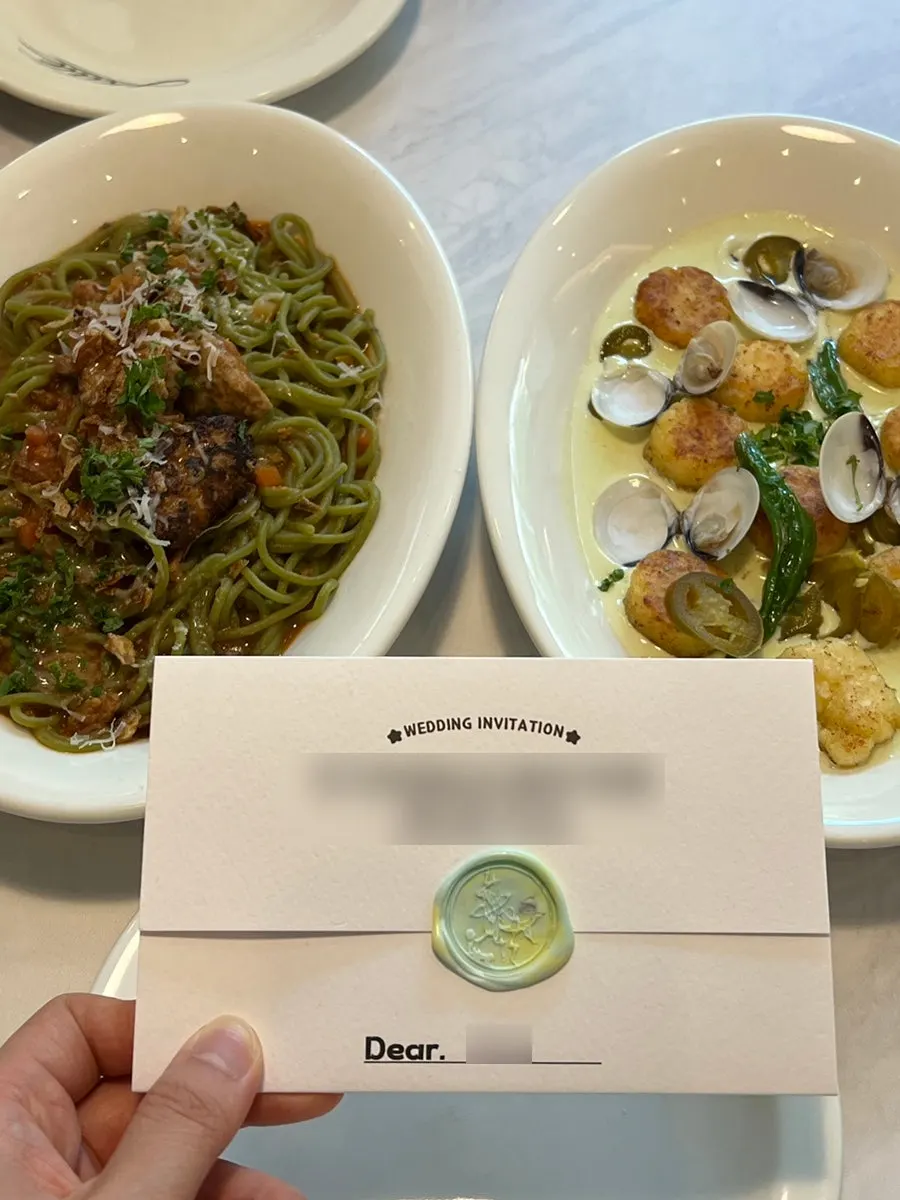 Pasta table set for the wedding invitation handover
