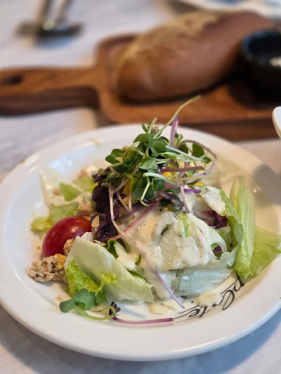 Fresh salad topped with granola