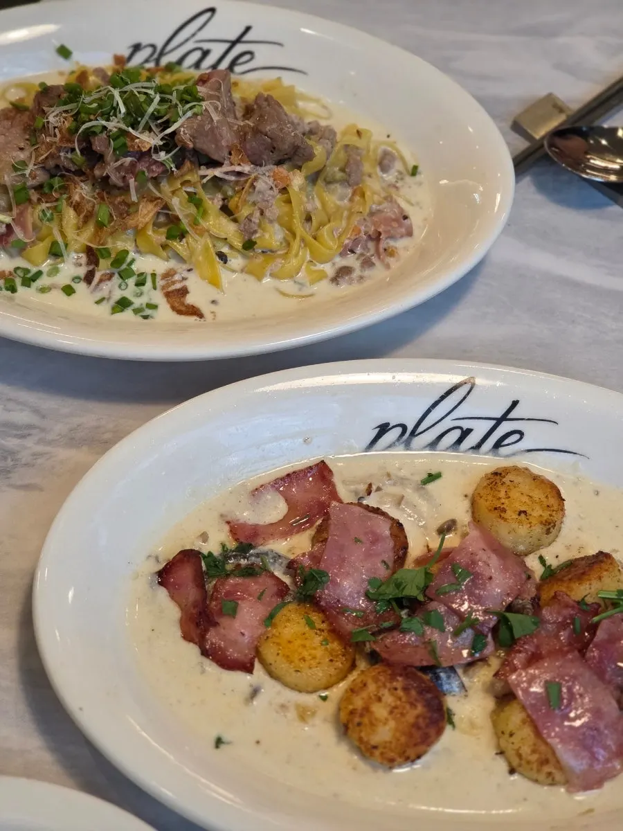 Two main dishes placed together on the table