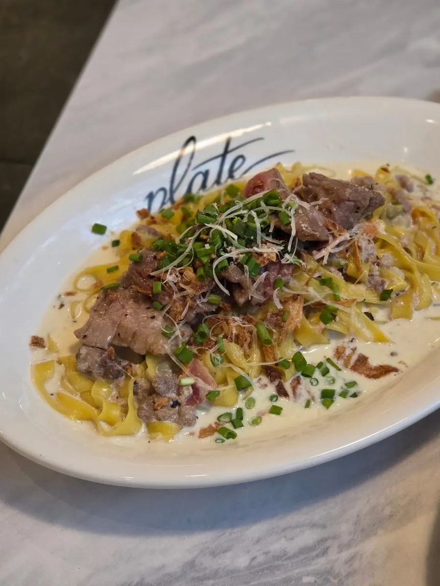 Steak cream ragu pasta served with tagliatelle noodles