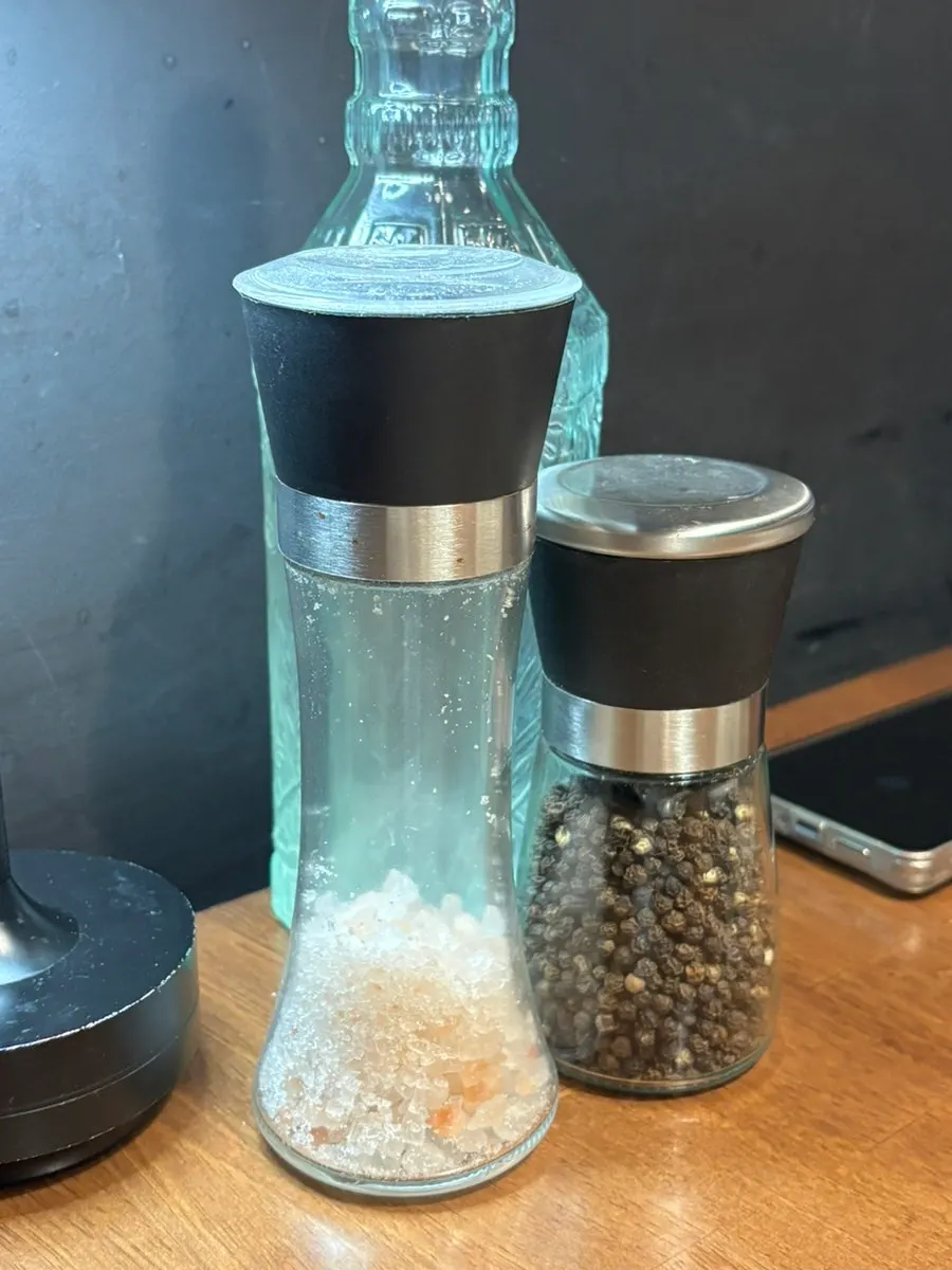 Table setting and water bottle at Plate