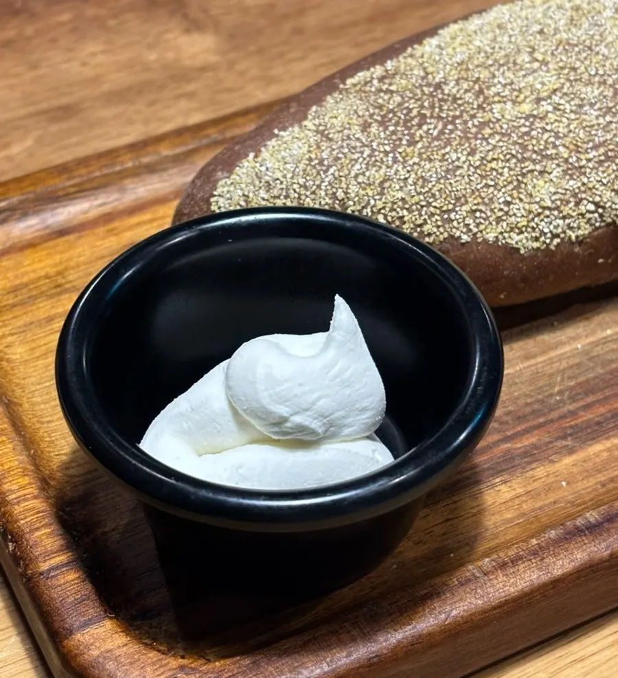 Bushman bread served with whipped cream