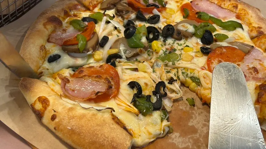 Freshly baked combination pizza