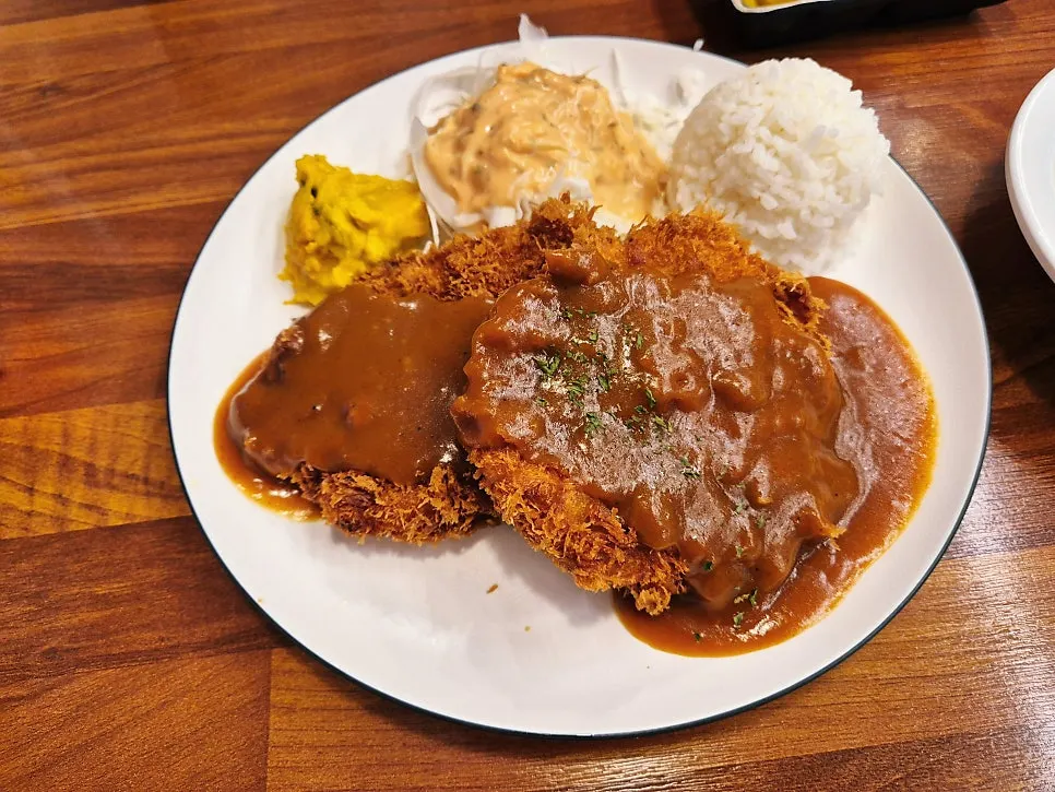 A plate of P&Chick's thick pork loin cutlet