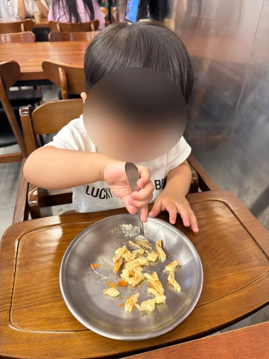 Family dining scene with baby at P&Chick