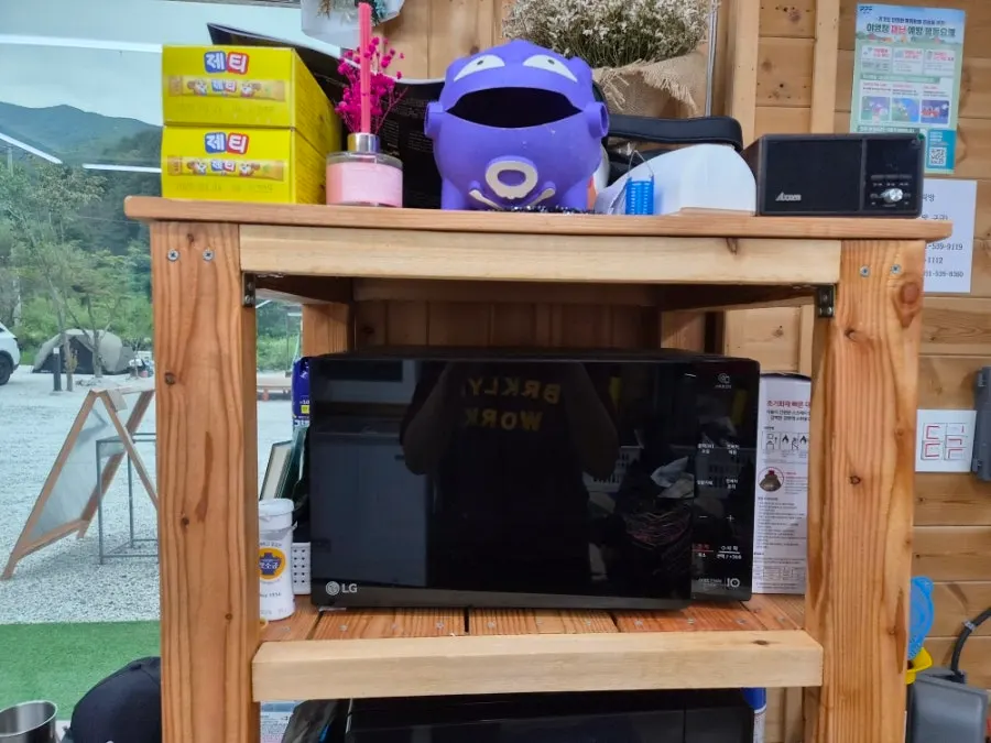 A microwave placed in the snack shop