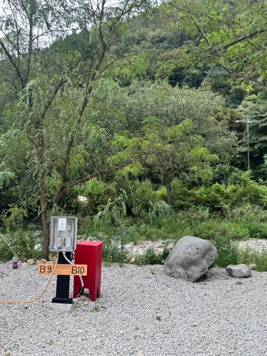 Completed tent pitching and camping setup