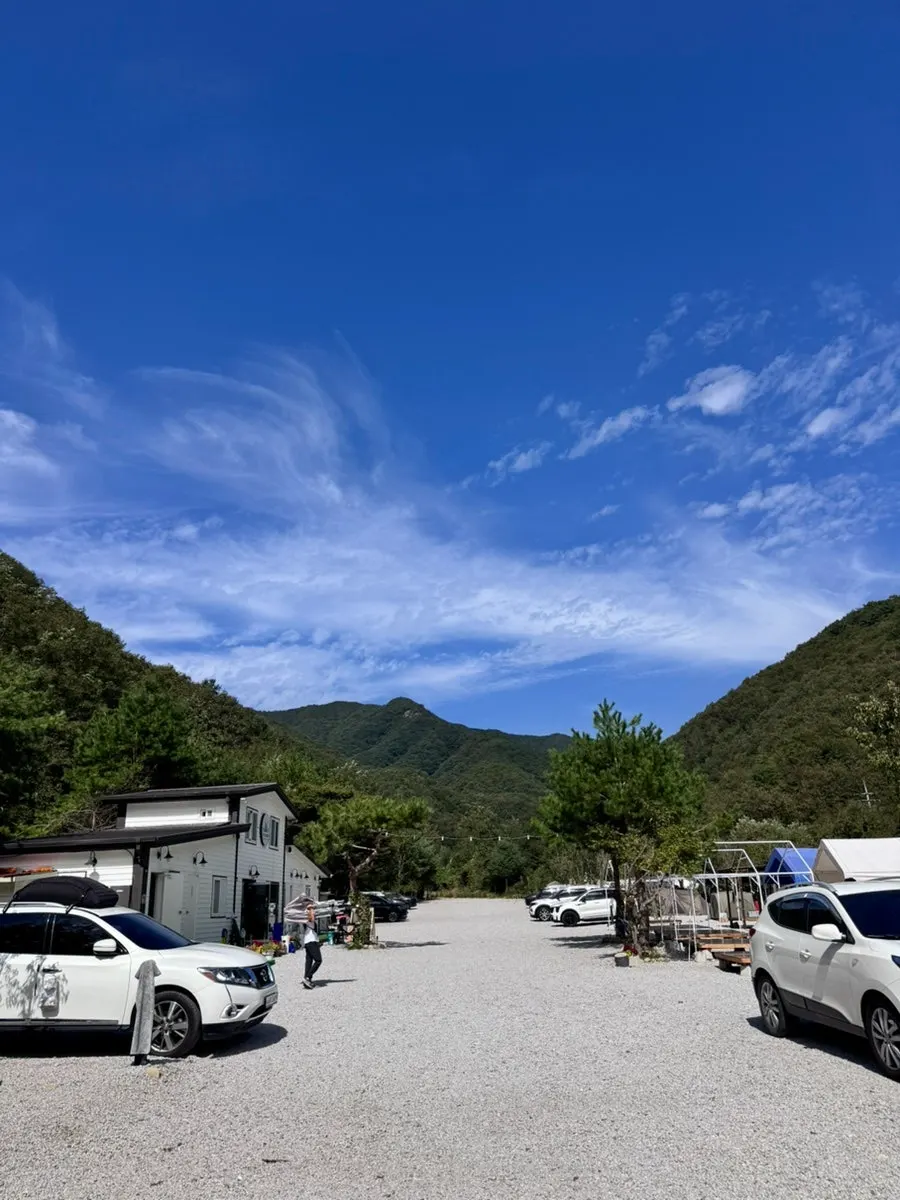 Byeolbit Camping Site surrounded by mountains on a clear day