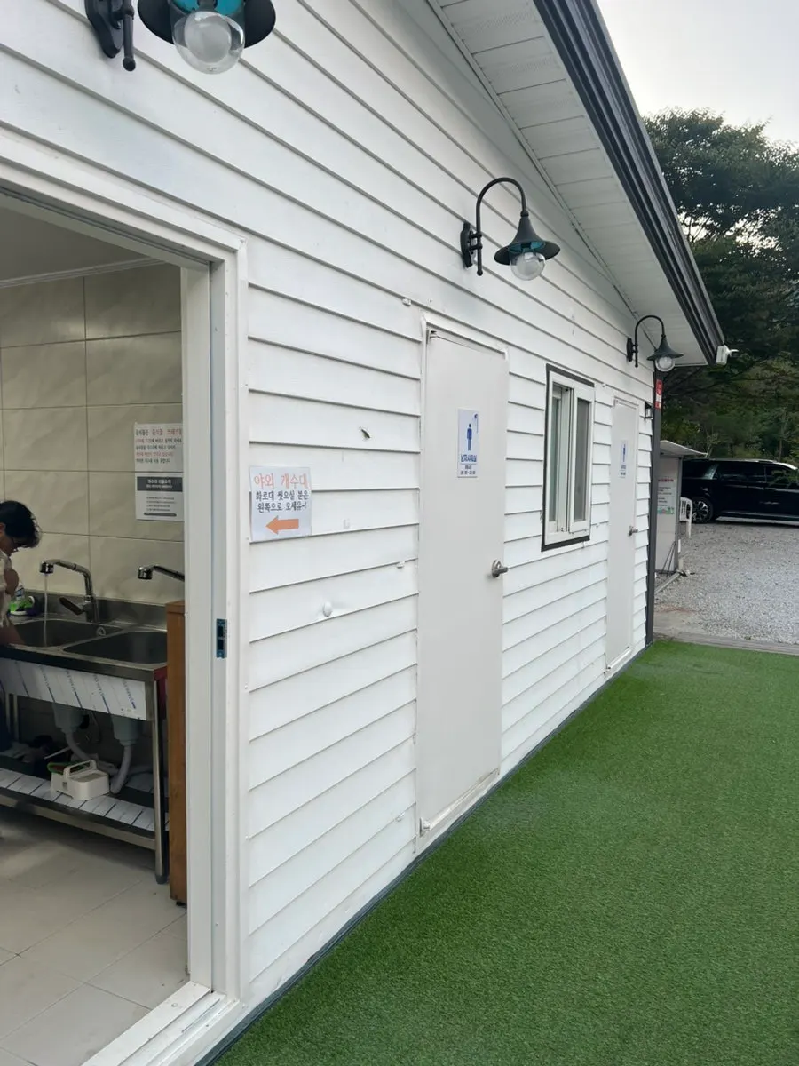 The women's restroom with three stalls at Byeolbit Camping Site
