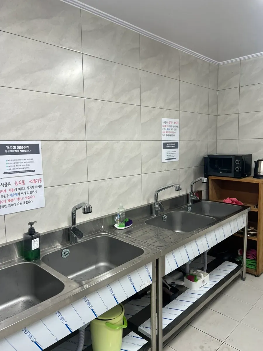 Interior of the restroom with toilet paper well stocked