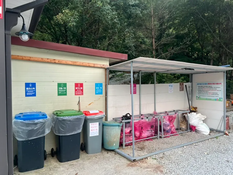 The well-organized recycling area at Byeolbit Camping Site