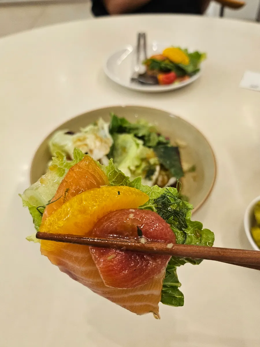 Eoneu Dal salmon salad served alongside the main dishes