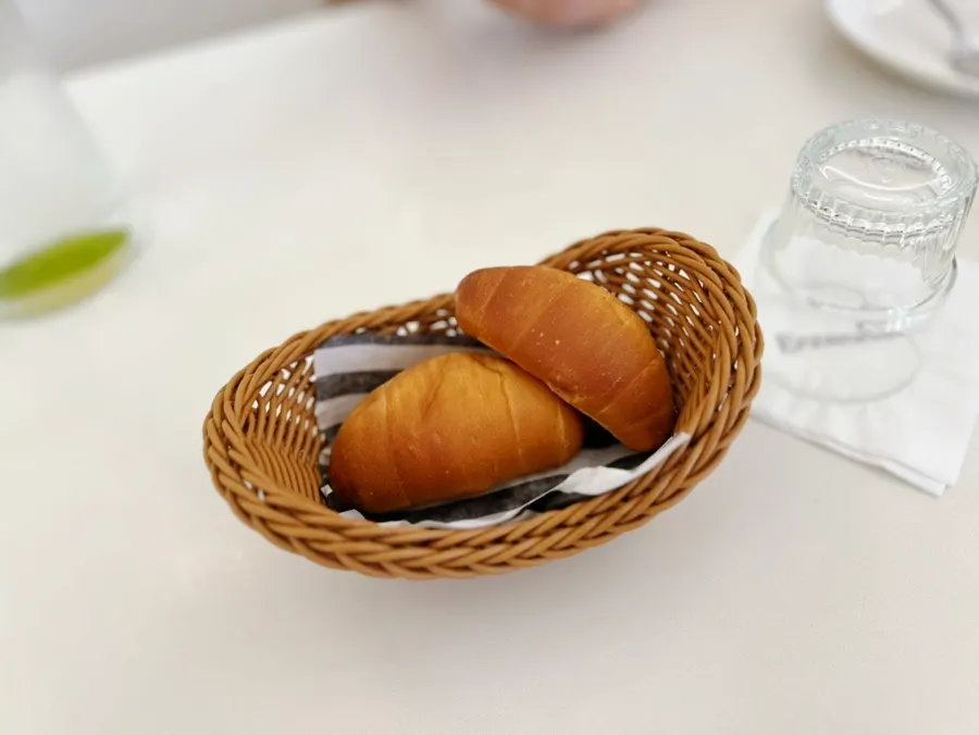House-made pickles and salt bread served before the meal