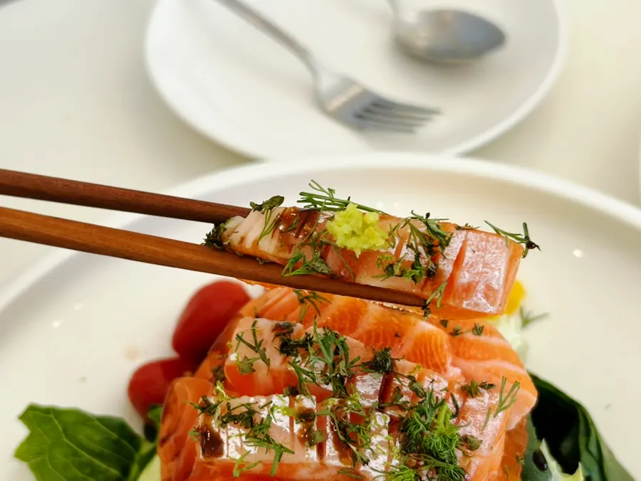 Salmon salad mixed with oriental dressing