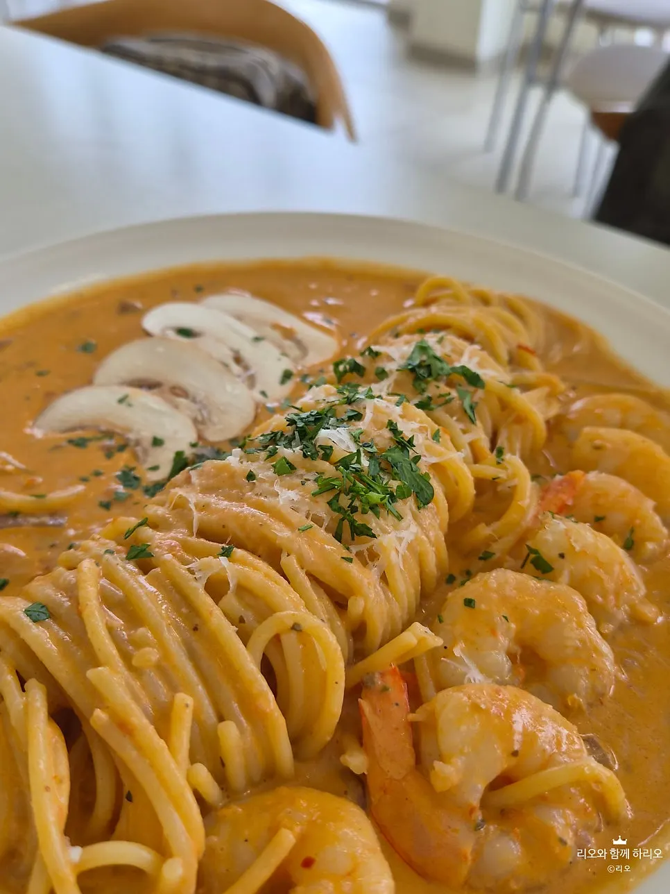 Rosé pasta with cream sauce and large shrimp
