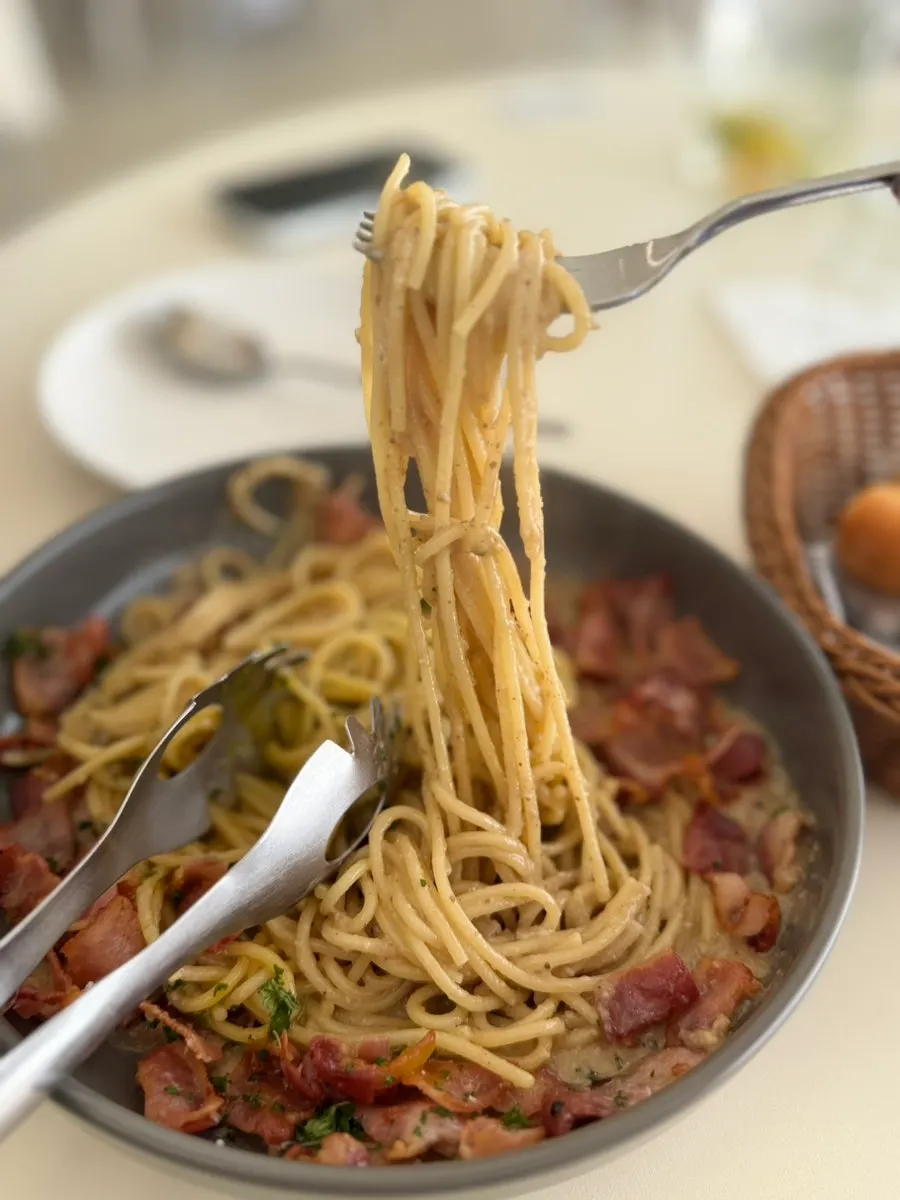 Carbonara mixed with egg yolk