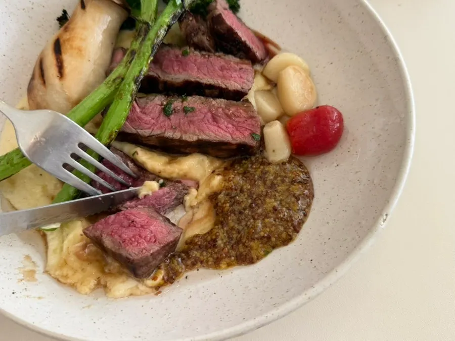 Medium-rare Korean beef striploin steak