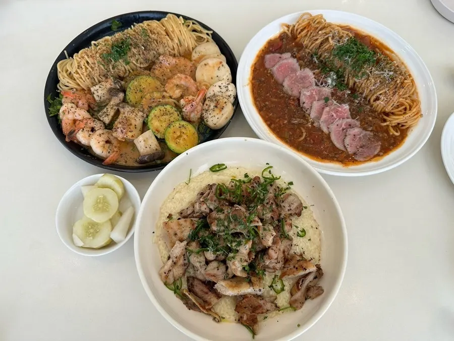 Table set with pasta and risotto together