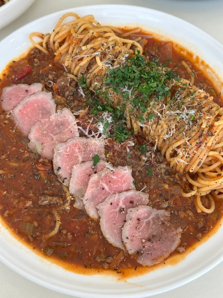 Beef tomato pasta topped with beef carpaccio