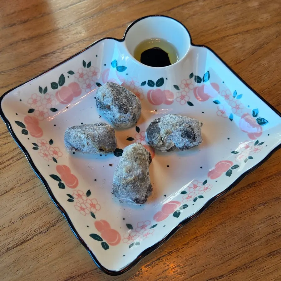Squid ink ciabatta bread with olive balsamic sauce