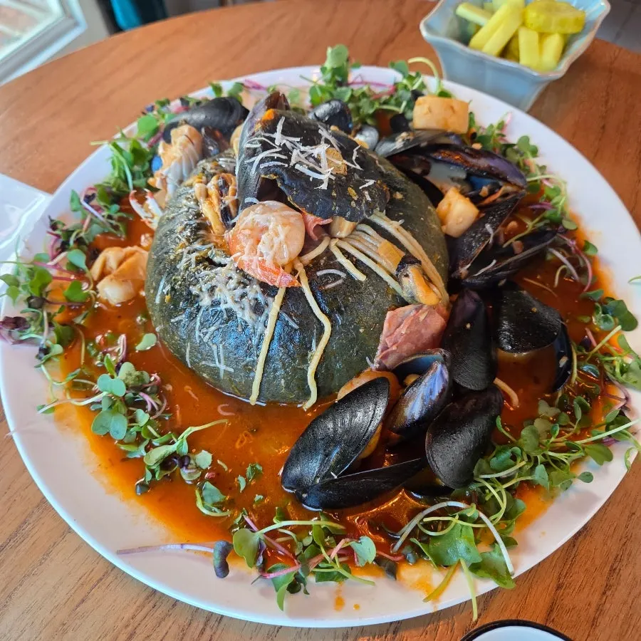 Zucca dolce pasta served inside a whole pumpkin