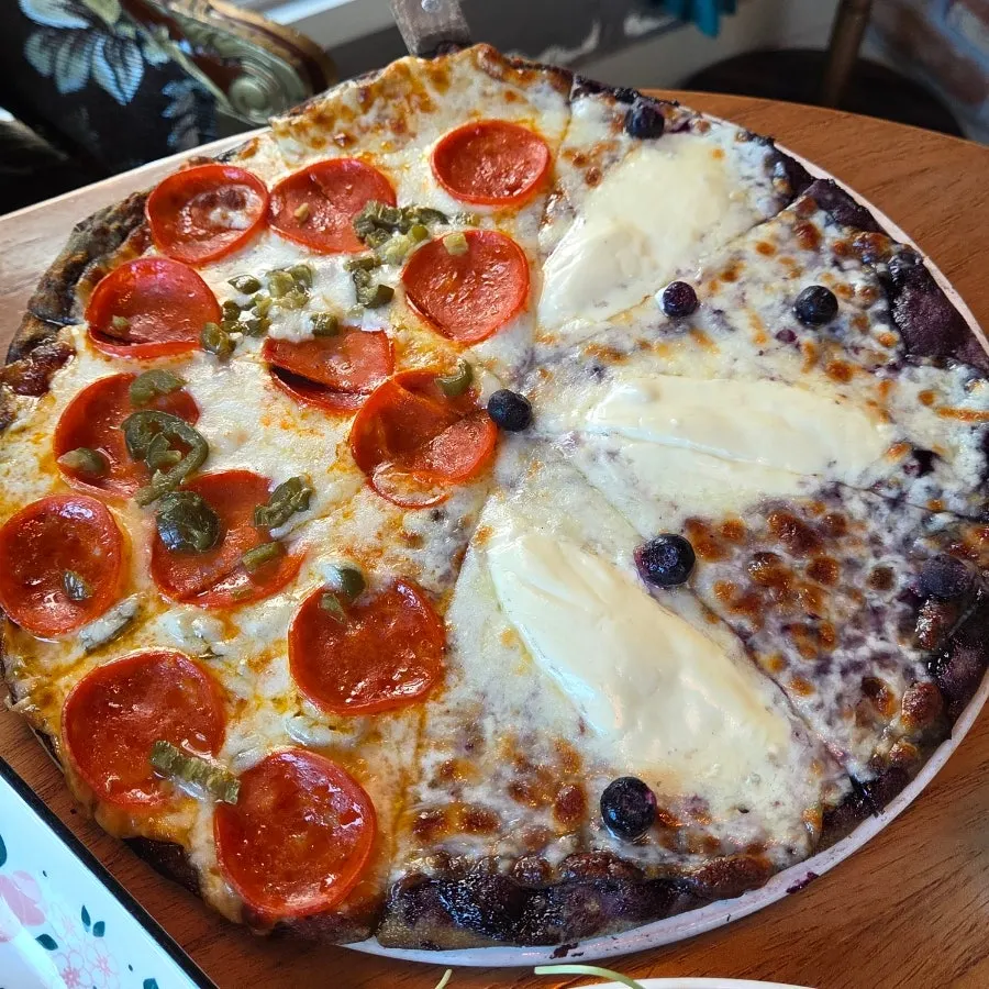 Half-and-half pizza with blueberry and spicy pepperoni