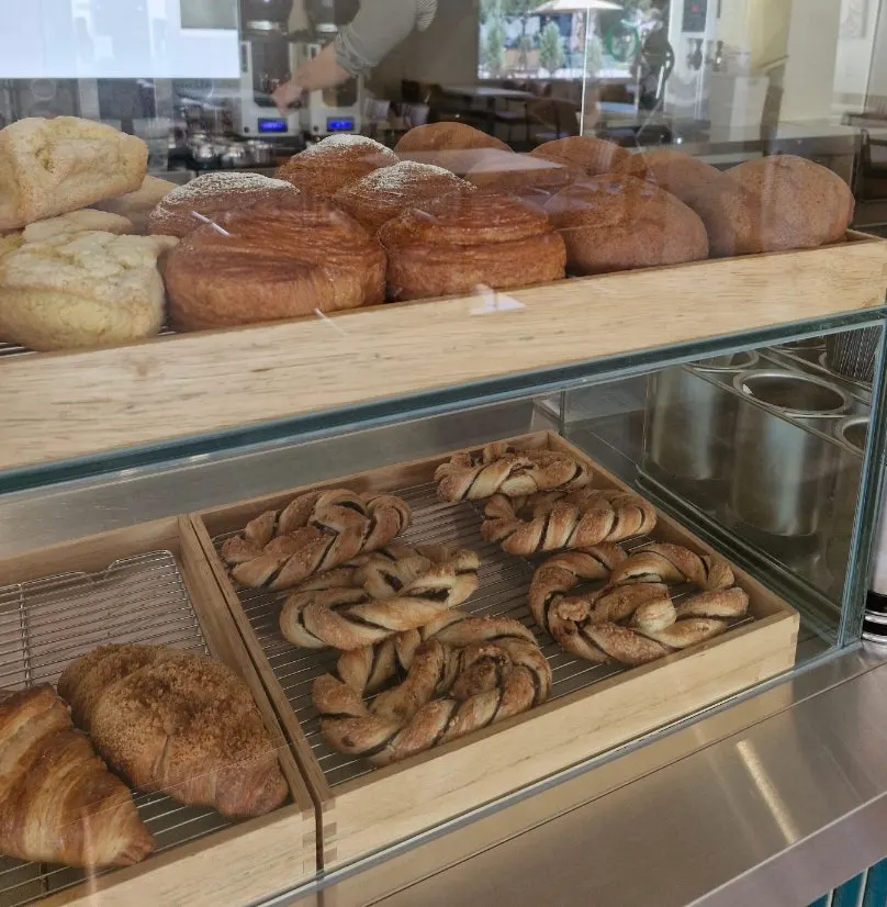 Display case of house-baked bakery items