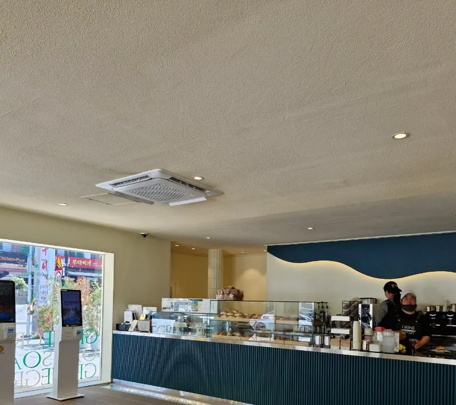 Bagels, croissants, and other baked goods on display