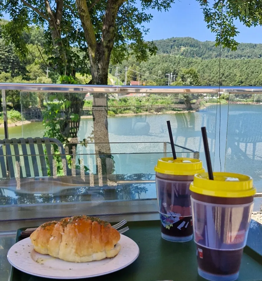 Iced Americano served in a reusable cup
