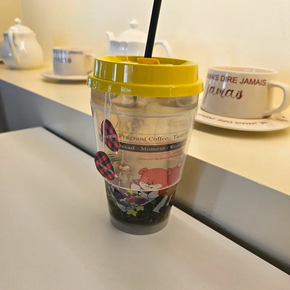 Ginger lemon herbal tea in a reusable tumbler