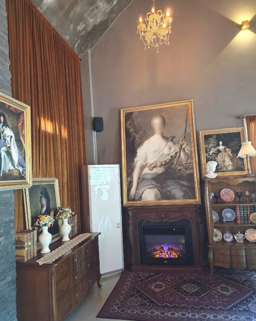 Interior decorated with antique furniture and frames
