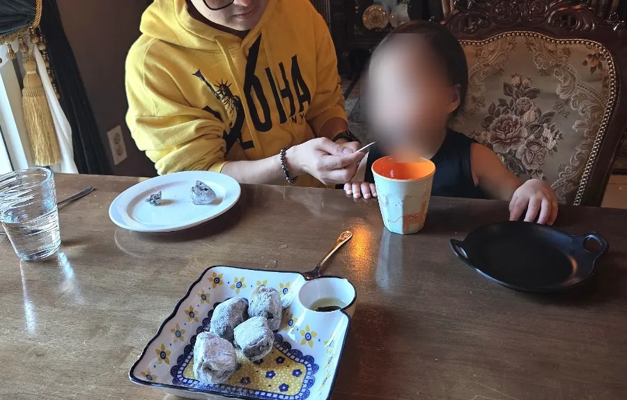 Child eating the pre-meal bread