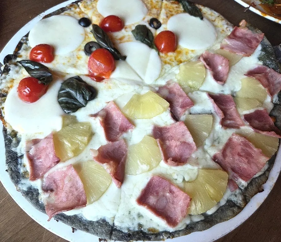 Half-and-half pizza with Hawaiian and Margherita