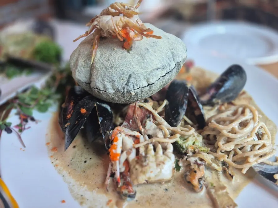 From Italy's gebawi pasta topped with crab and puffed bread