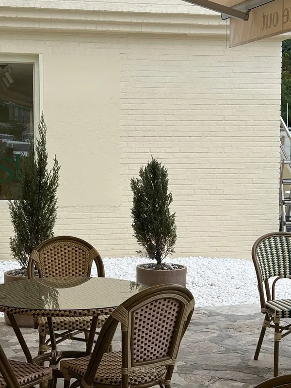 Outdoor terrace seating at the annex