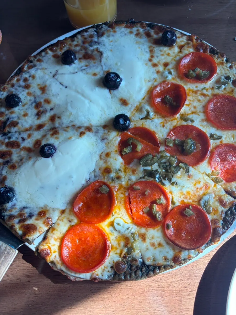 Half-and-half pizza with blueberry and spicy pepperoni