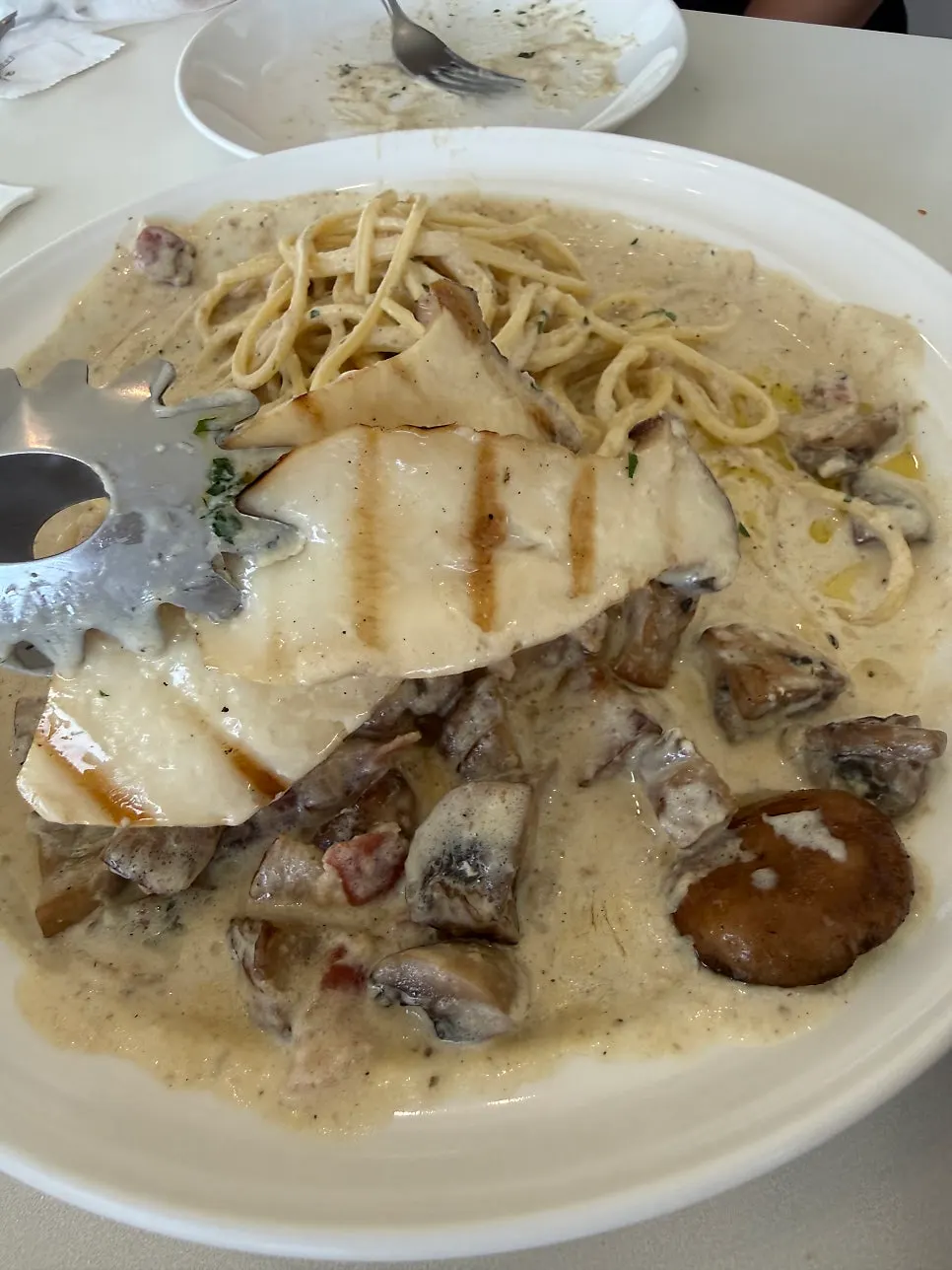 Cream pasta loaded with mushrooms